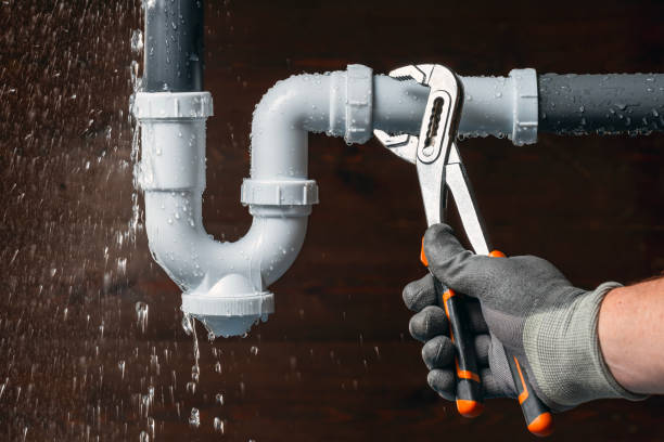 Professional Drain Cleaning technician working in Howell, MI